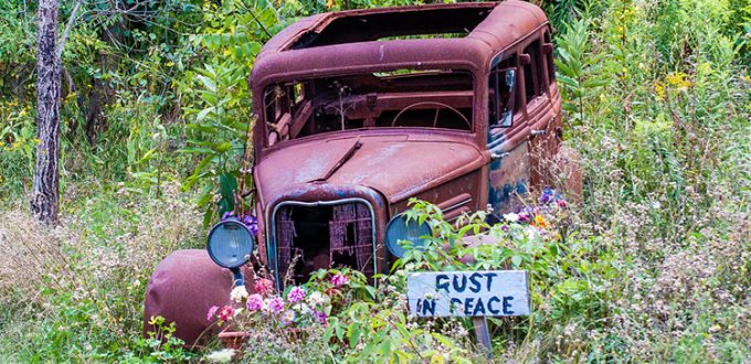 Rusty Junk Car in Grass